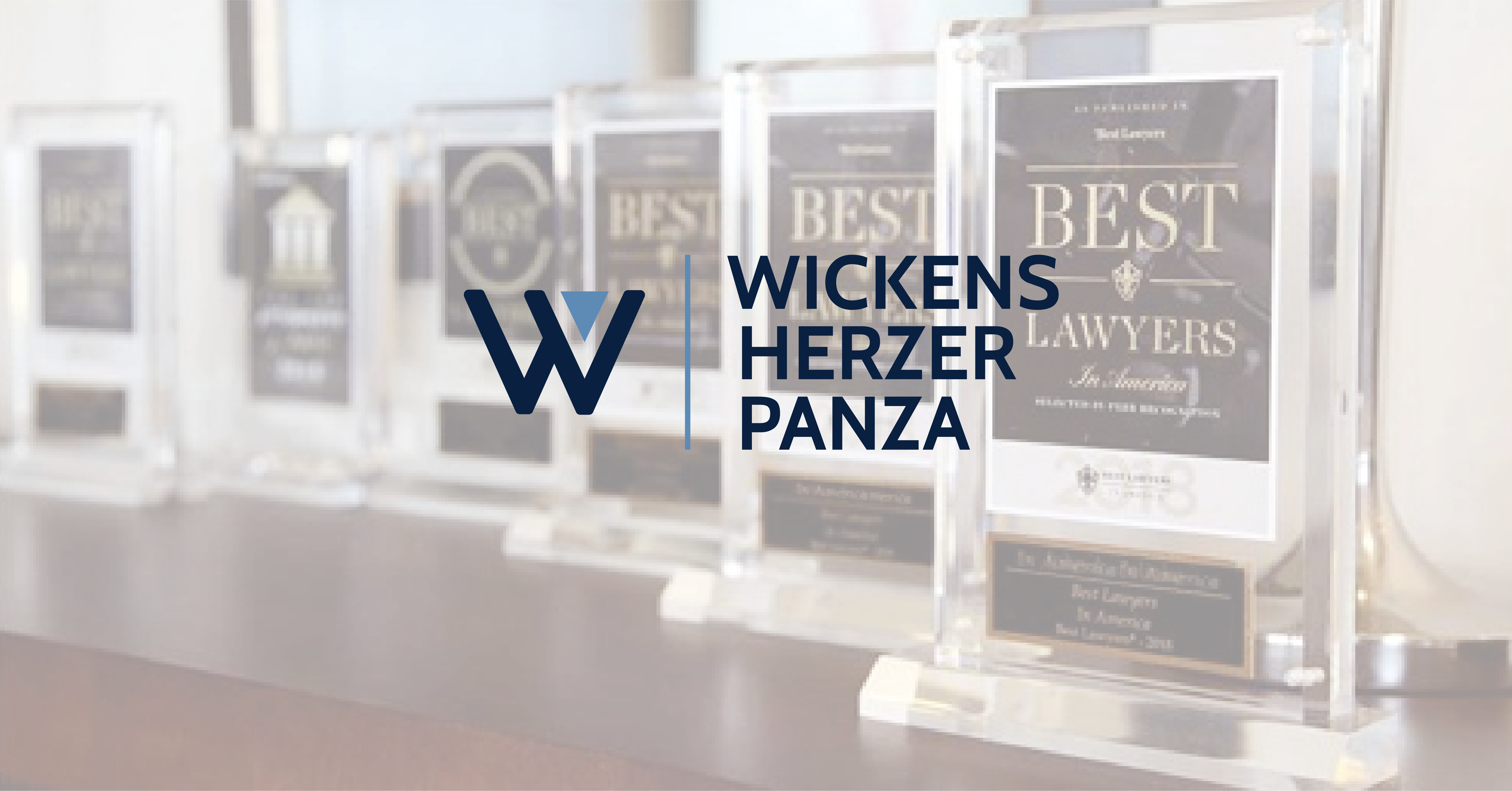 Wickens Herzer Panza logo with trophies